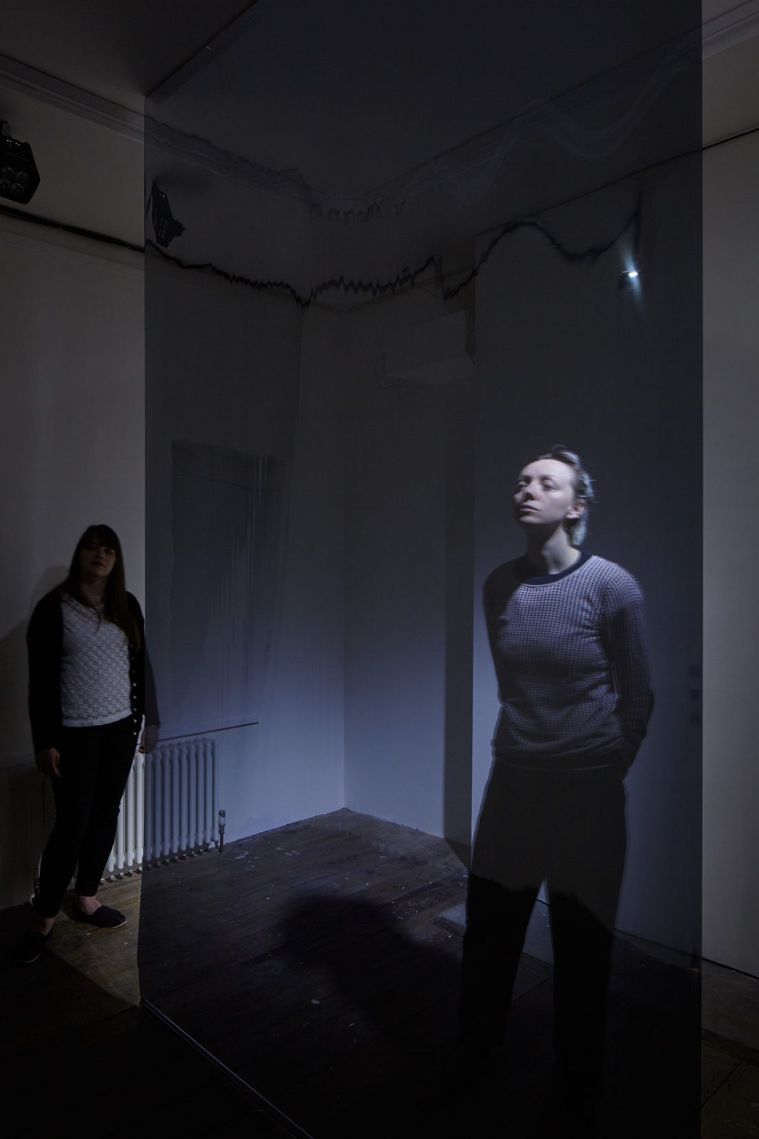 <p>Person experiencing Sally Golding’s exhibition <em>Your Double My Double Our Ghost</em> in the First Floor Galleries, 2016. Photo: Andy Stagg</p>