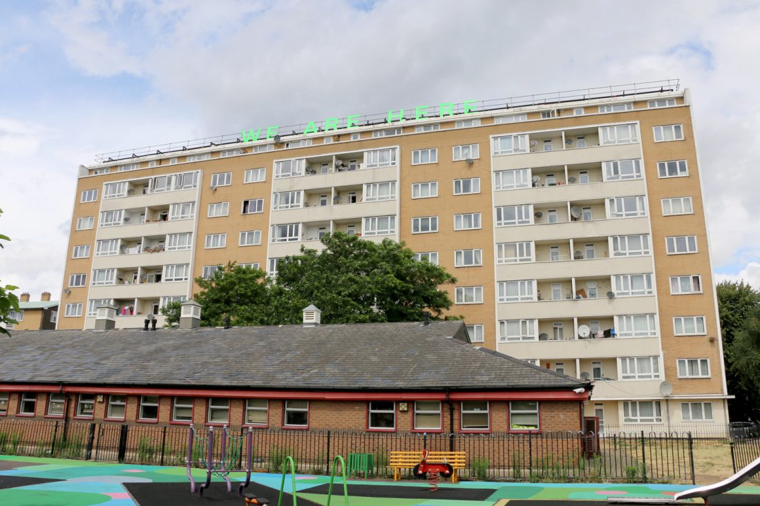 <p>Jessie Brennan, <em>We Are Here</em>, 2018, text installation, Heron House, Pelican Estate. Photo: Jessie Brennan</p>
