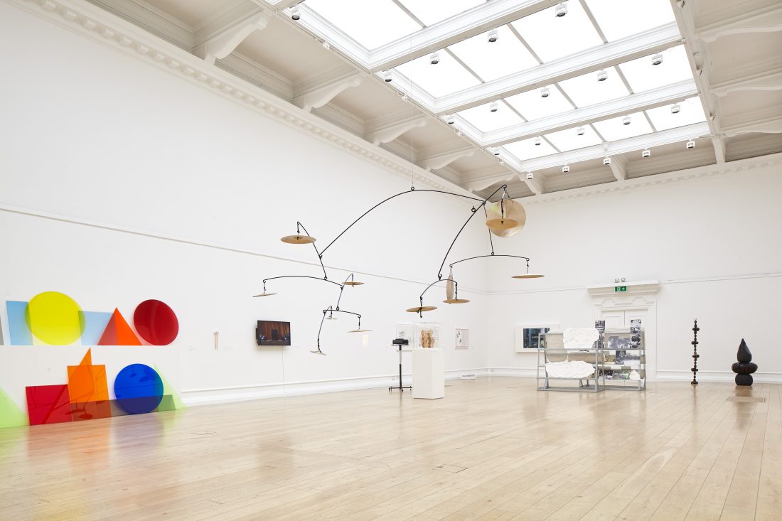 Cymbals and coloured geometric shapes in the Main Galleries forthe 2016 exhibition Under the Same Sun, 2016.