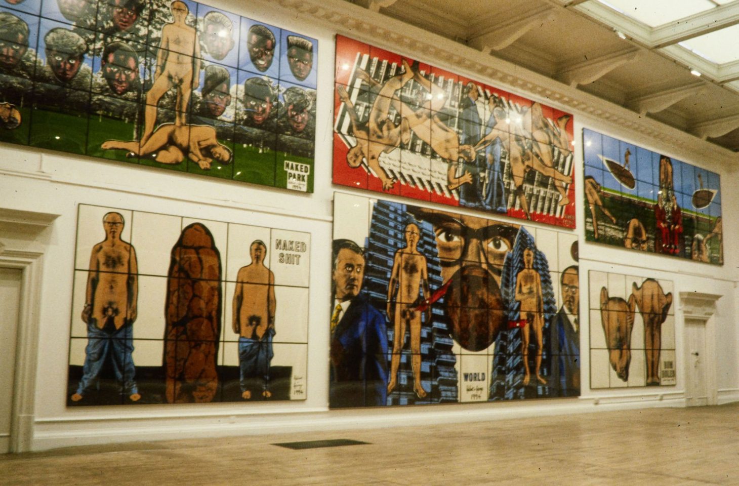 Installation view of Gilbert &amp; George&#8217;s 1995 exhibition The Naked Shit Pictures (+ The Naked Shit Model)
