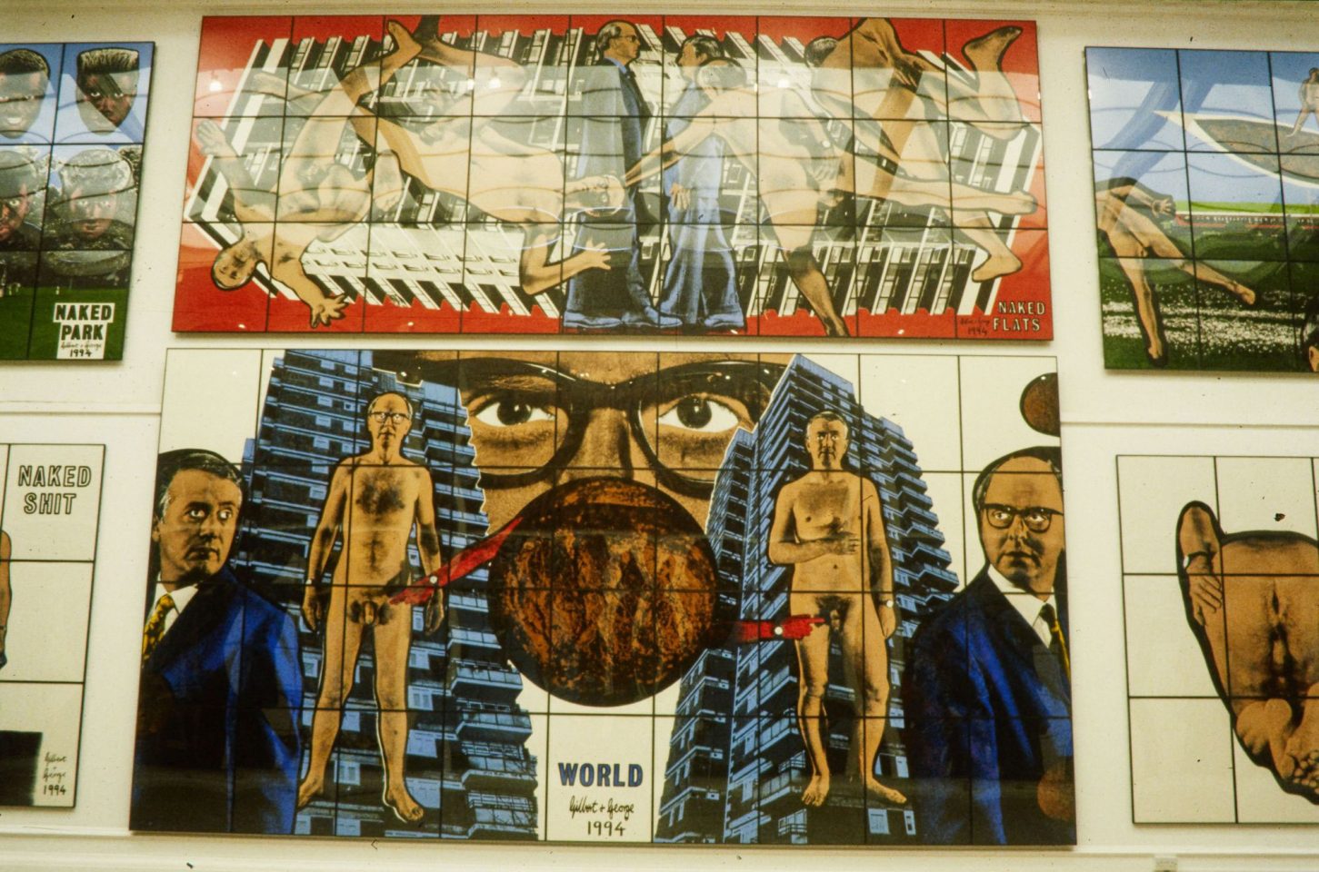 Installation view of Gilbert &amp; George&#8217;s 1995 exhibition The Naked Shit Pictures (+ The Naked Shit Model)
