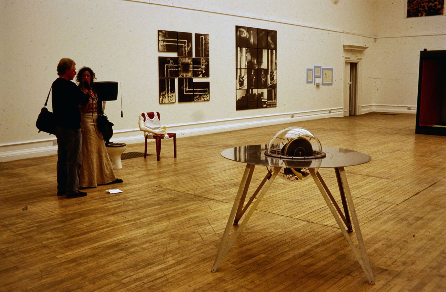 Installation view of 1995 exhibition Minky Manky including work by Sarah Lucas, Tracey Emin, Gary Hume, Damien Hirst, Matt Collishaw, Critial Decor, Stephen Pippin, Gilbert and George. Curated by Carl Freedman.
