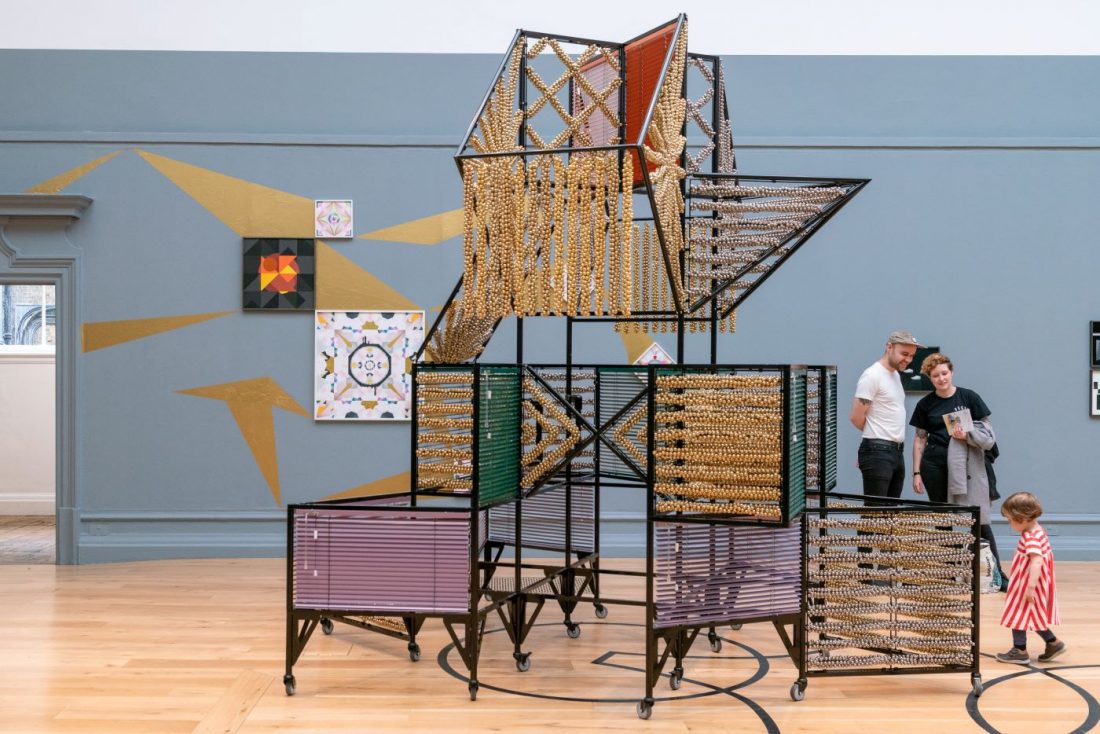 <p>A child enjoys Haegue Yang, <em>Tracing Movement</em>, in the Main Gallery.<br />
Photo: Sam Nightingale.</p>
