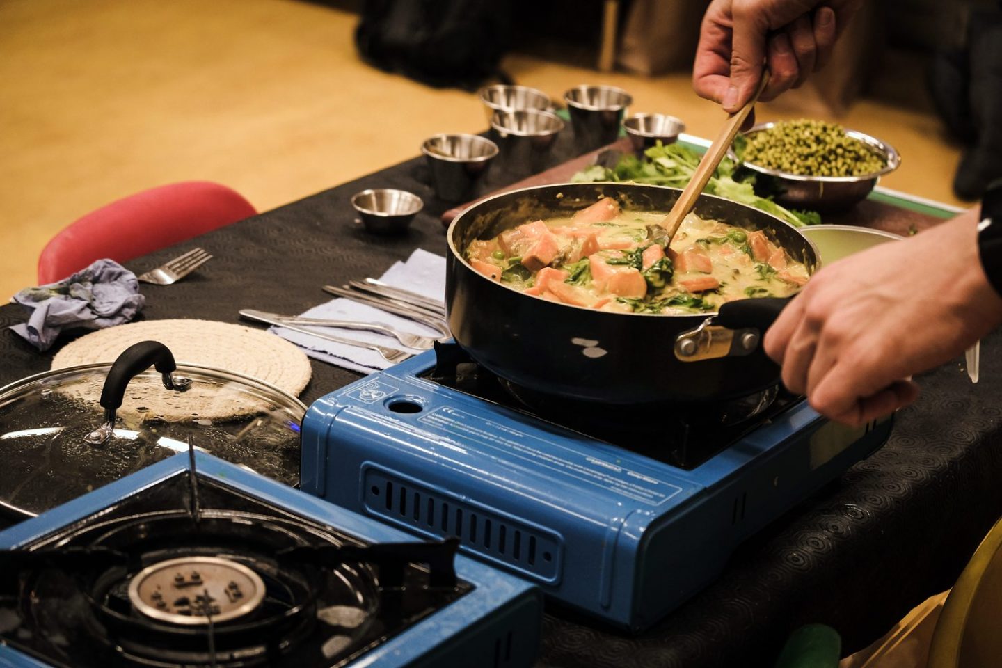 A pot of vegetable curry on a stove