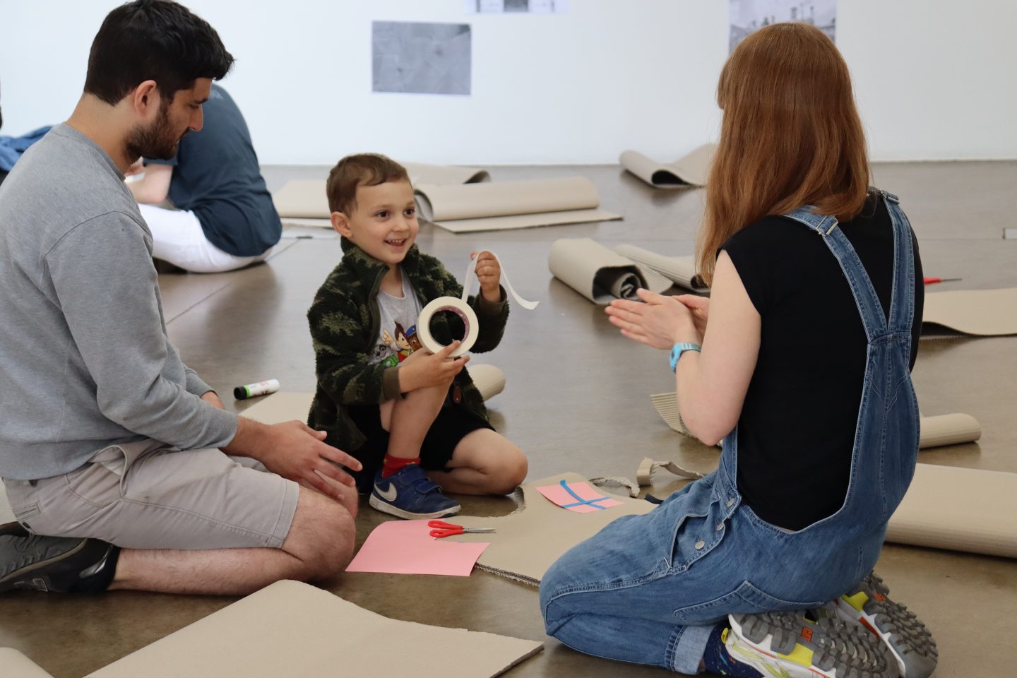 A young child taking part in an art workshop