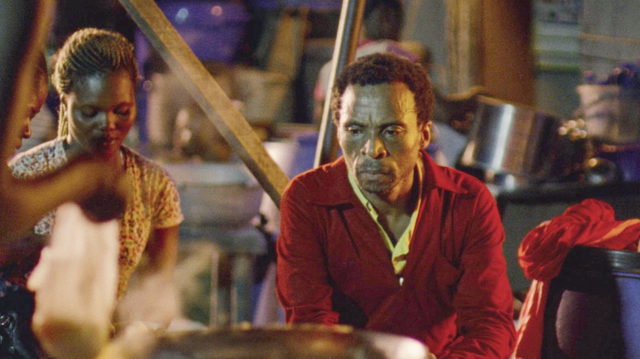 A man in a red jacket