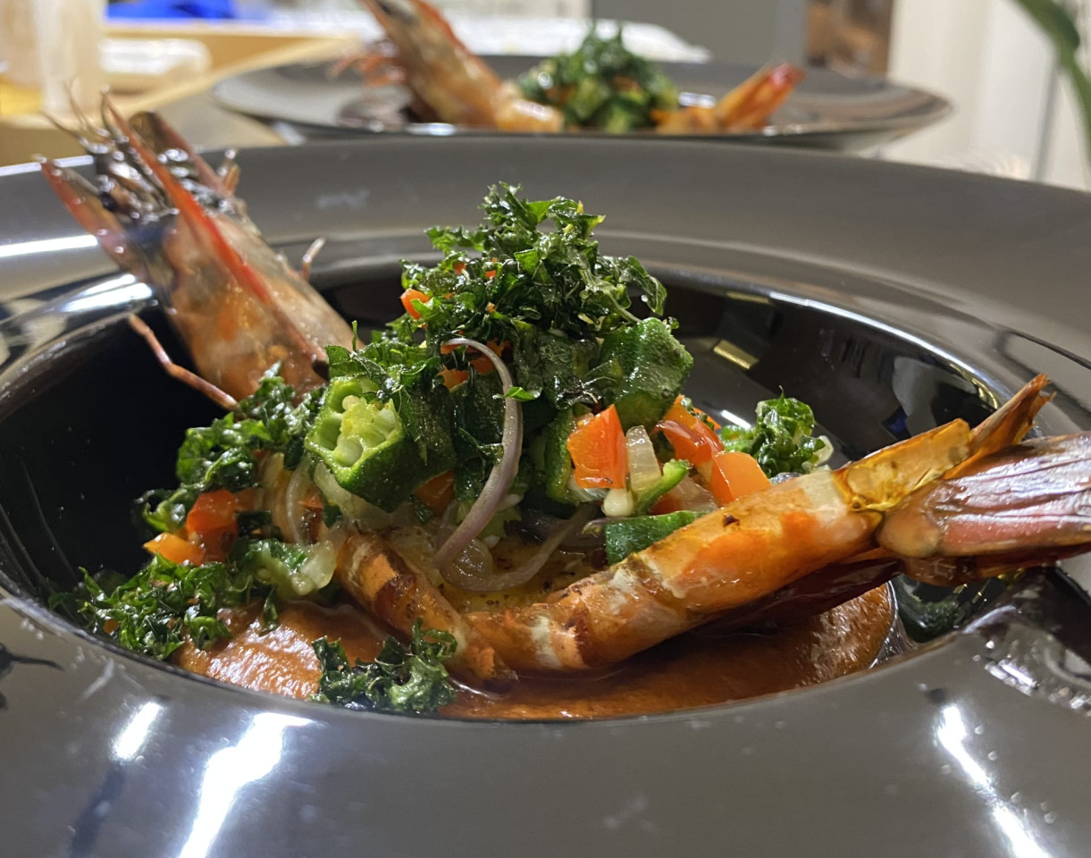 A plate of food by Chef Wu