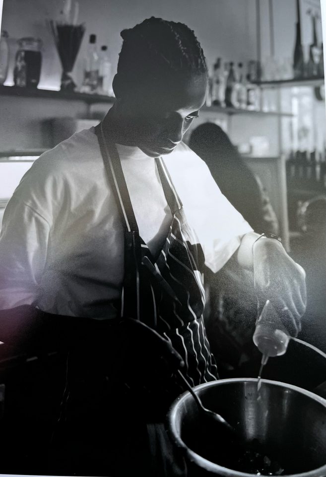 A chef making food in a kitchen