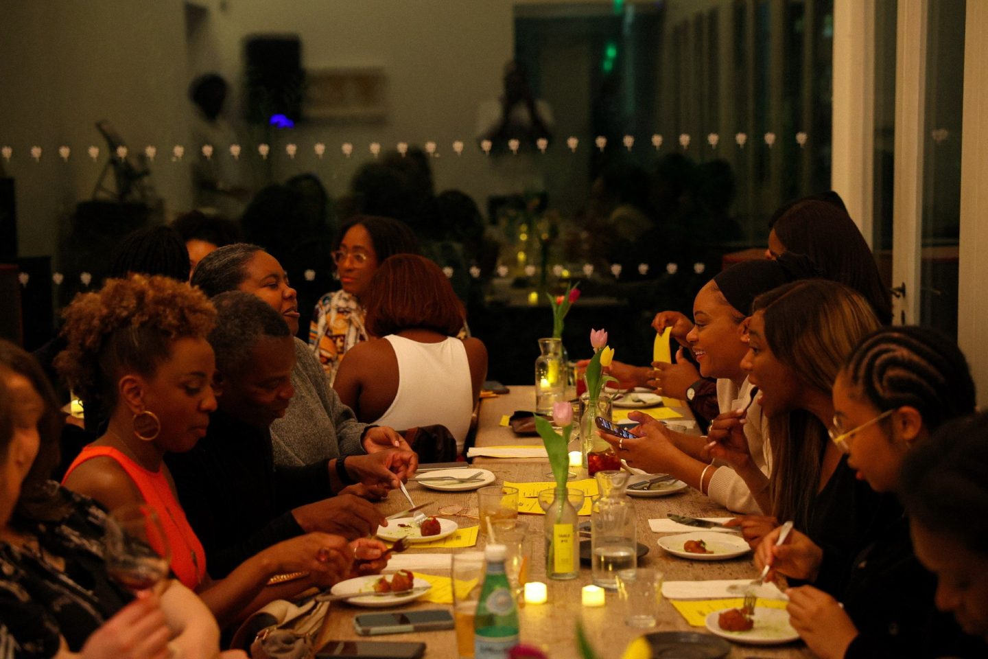 People sit in a restaurant and enjoy food