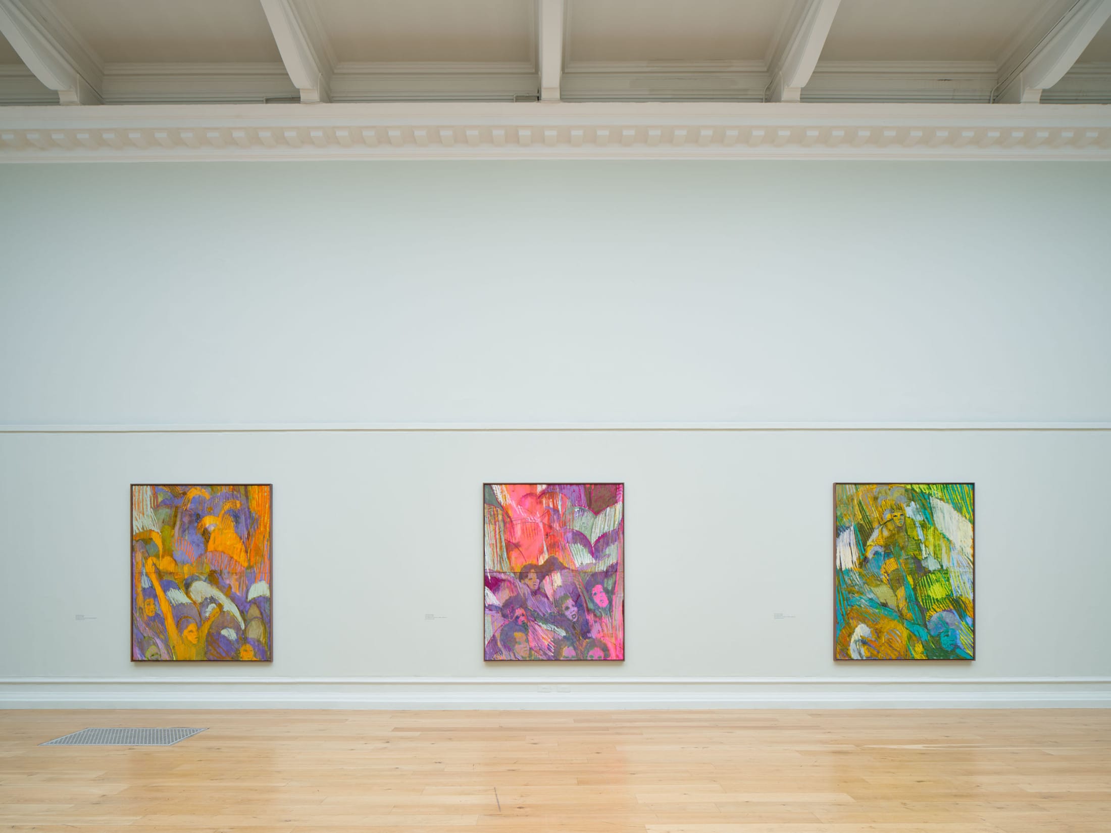 Three paintings by artist Christina Kimeze on a gallery wall at the South London Gallery.