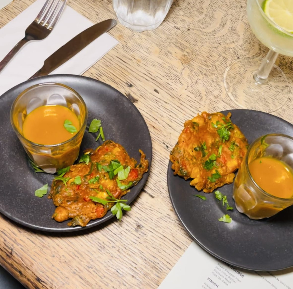 A photo of a plate of food from a Caribbean Mexican fusion supper club.