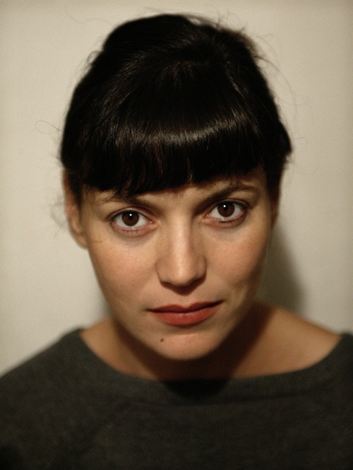 A portrait photo of artist Yto Barrada. She looks directly to camera.