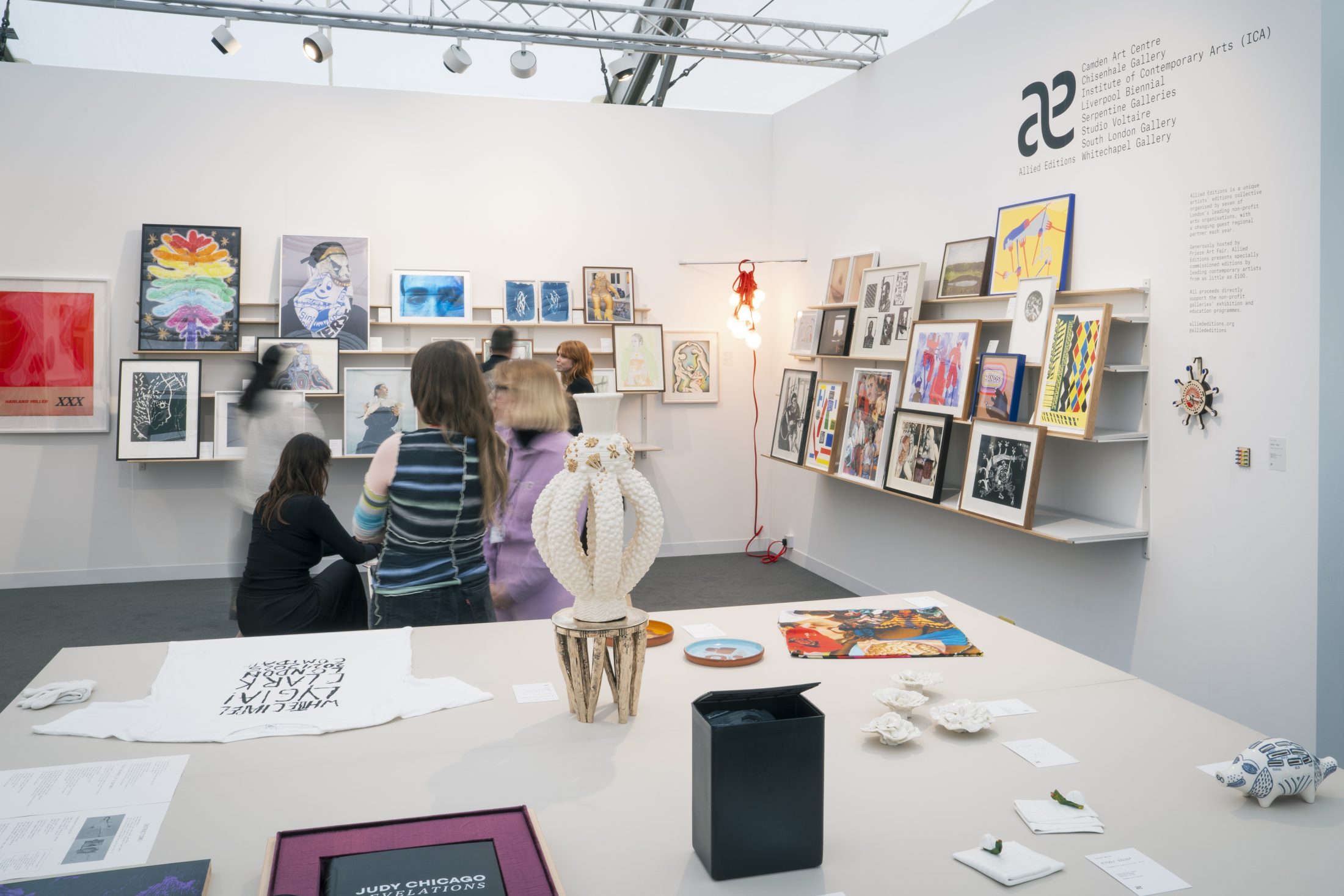 People at Frieze London Allied Edition booth. Including affordable limited edition artwork for sale.